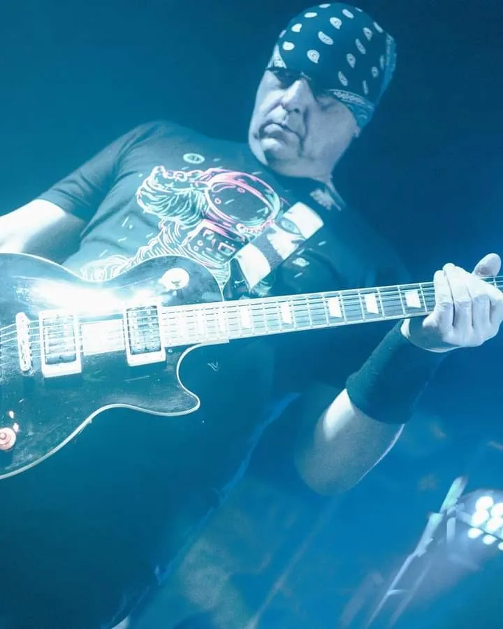 Ace Parlier playing a Les Paul on stage